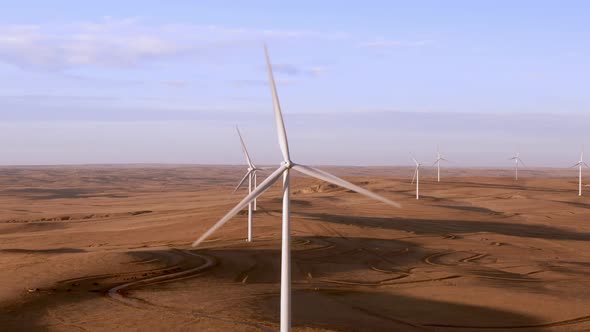 Aerial shots of a wind farm near Calhan in Colorado around sunset