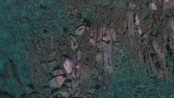 Aerial Shot of Coastline Bay with the Rocks and Cliffs