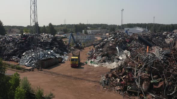 Old Wrecked Cars in Junkyard Waiting to Be Shredded in a Recycling Park