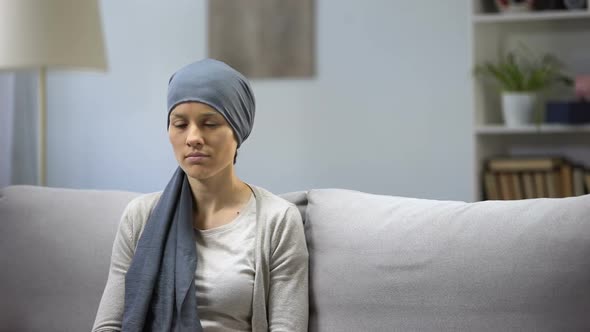 Smiling Woman With Cancer Hugging Mother, Hope and Togetherness, Remission