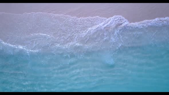 Aerial above seascape of relaxing lagoon beach voyage by blue lagoon with bright sandy background of