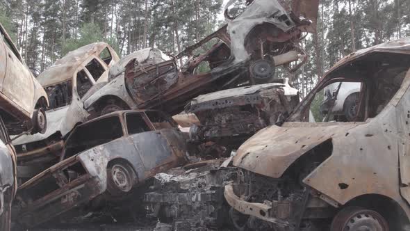 War in Ukraine a Dump of Burned Cars in Irpin Bucha District