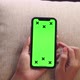 Top view chroma key smartphone technology, cell phone scrolling by hand concept. - VideoHive Item for Sale