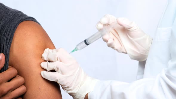 Man Getting The COVID-19 Vaccine