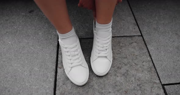 Unrecognizable Woman Wearing White Sneakers