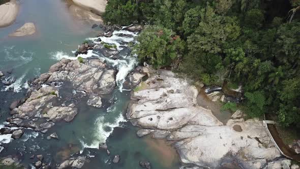 Flying over the beautiful countryside nature of rivers, waterfalls and trees of Brazil. A very roman