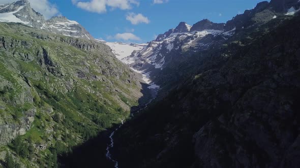 Flying Over the Alpine Mountains