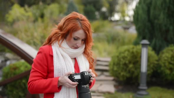 Beautiful Woman Making Photo Using Professional Camera