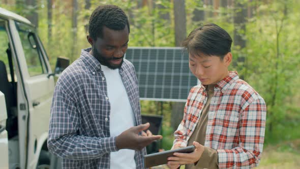 Scientists Using Digital Tablet