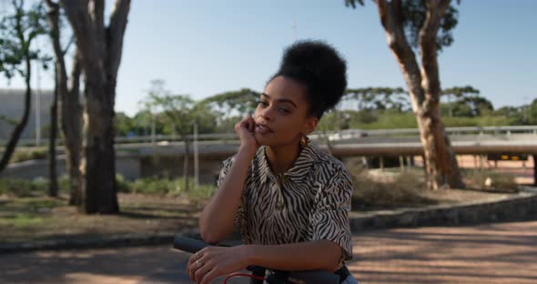 Front view of mixed race woman in park