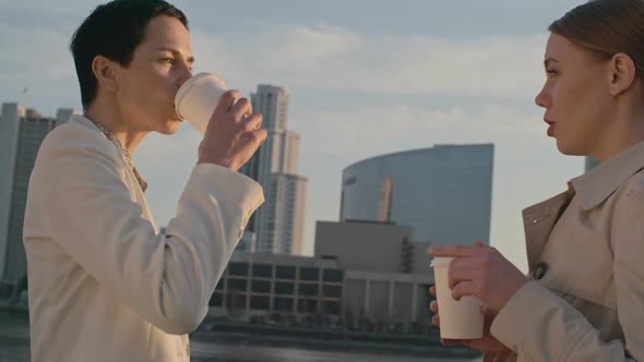 Women Drinking Coffee while Talking