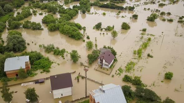 Aerial view of flooded houses with dirty water of Dnister river in Halych town, western Ukraine.