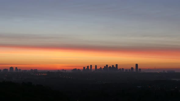 Skyline Silhouette During A Beautiful Golden Sunset With Fogs. - timelapse