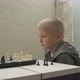 Cute Little Boy Playing Chess at Home - VideoHive Item for Sale