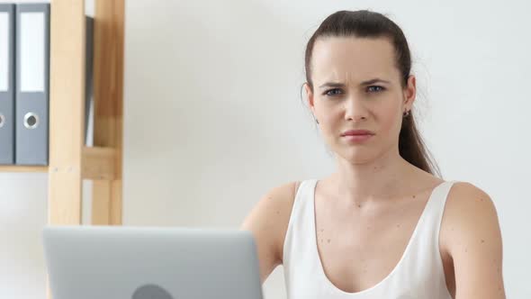 Shaking Head to Deny Rejecting at Work in Office