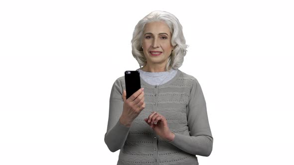 Attractive Senior Woman Taking Selfie with Phone