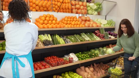 Multiethnic Couple Shopping in Grocery Store