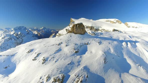 Mountain Peak and Ski Runs Aerial View