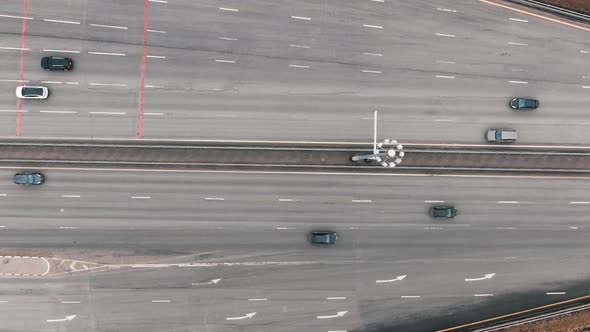 Cars Drive Under Payment Point Gateway on Road with Barriers