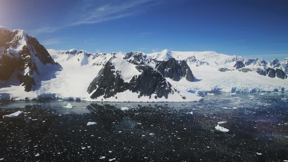 Snow Mountains, Antarctica Shoreline. Aerial Shot.