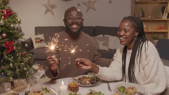 Happy African-American Couple Celebrating Christmas