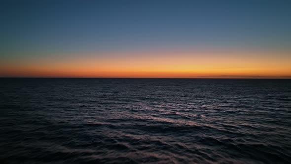 Flying on Beautiful Sunset Over the Sea