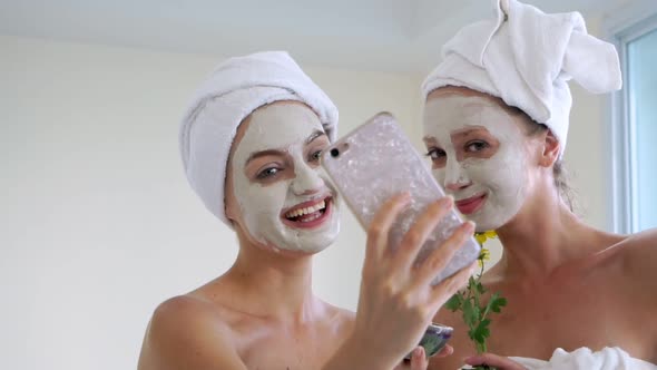 Beautiful Woman Having a Facial Treatment at Spa