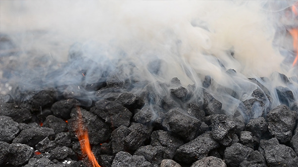Thick White Smoke From Burning Coal