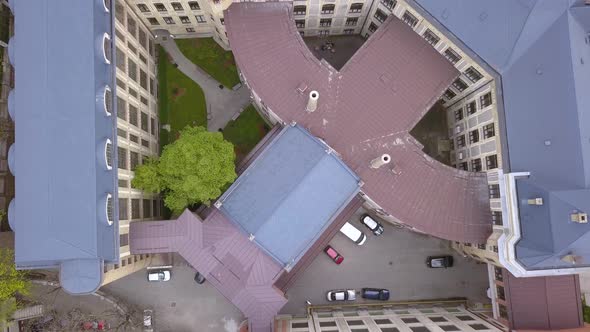 Aerial Drone Shot Pulling Straight Up Revealing a Mid Century Building.