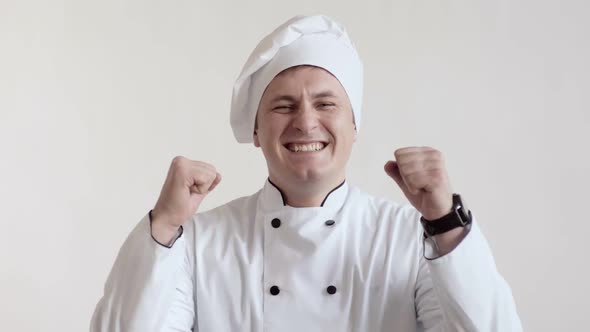 Porter Male White Chef in Costume Screams Expressively Scream Looking at the Camera