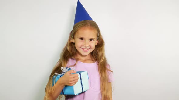 Laughing Girl Appears With a Gift and Whistles