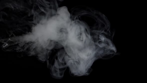 Abstract Smoke Cloud, Smoke In Slow Motion On Black Background