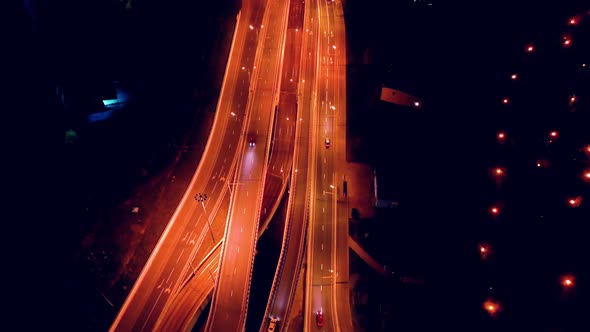 Freeway Intersection Traffic Trails in Night Moscow