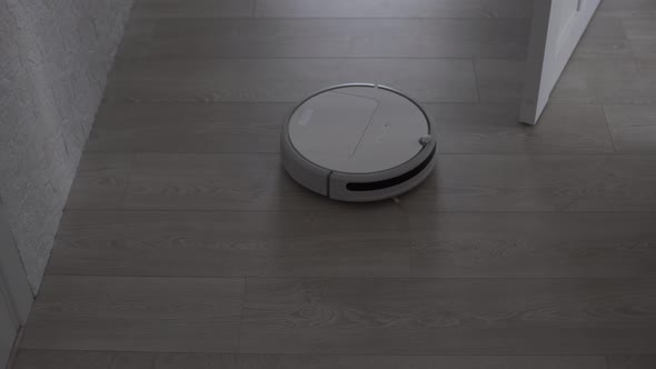 White Robotic Vacuum Cleaner