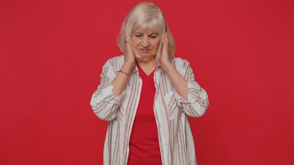 Frustrated Irritated Senior Woman Covers Ears Avoiding Advice Ignoring Unpleasant Noise Loud Voices