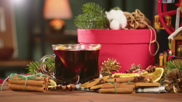 Hot Wine in Glass Mugs Gluhwein and Cinnamon Closeup