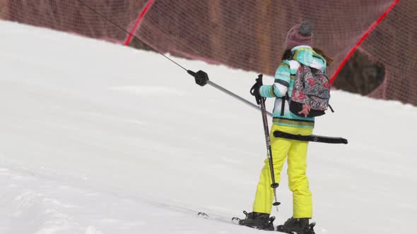 Amateur Skier Girl on a Lift