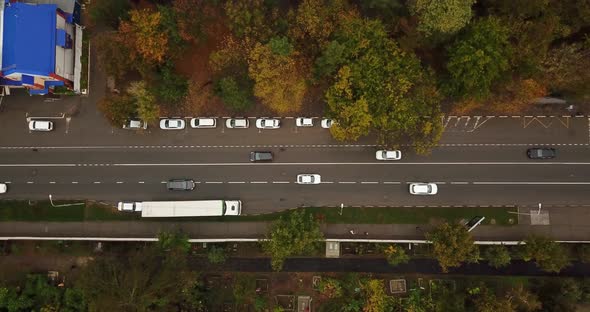 Top Down Drone Point of View - Steet City Road Intersection in Autumn Time