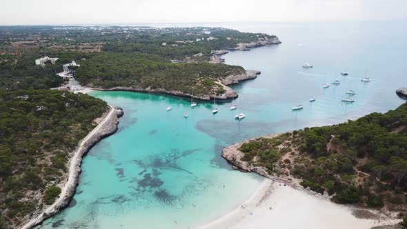 Aerial: The beach of Cala Mondrago in Mallorca, Spain