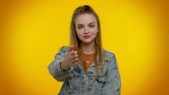 Friendly Girl Outstretching Hand to Camera Offering Handshake Greeting with Kind Smile Welcoming