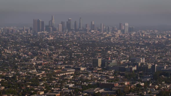 Aerial of houses and buildings in city