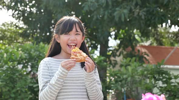 Beautiful Asian Girl Eating Eating Pizza Outdoor 