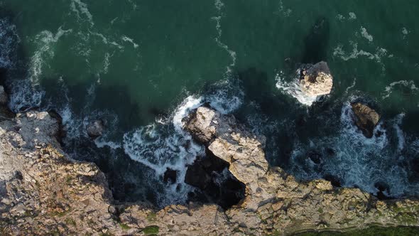 Aerial View of Sea Waves and Fantastic Cliffs Rocky Coast