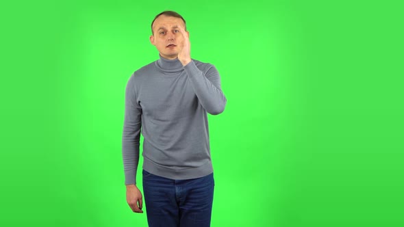 Male Is Screaming Calling Someone . Green Screen