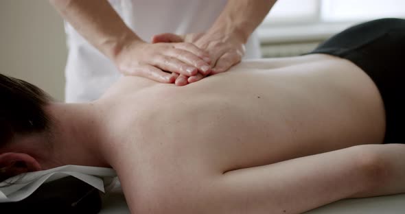 Closeup Filming of Hands Massaging Back Rehabilitation Massage