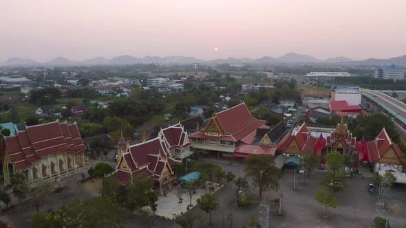 Aerial view of pagoda stupa.Temple Park, Ratchaburi, Thailand with urban city town