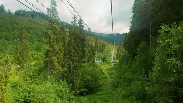 View From the Chair of the Cable Car on the Panorama of the Mountains on a Summer Sunny Day