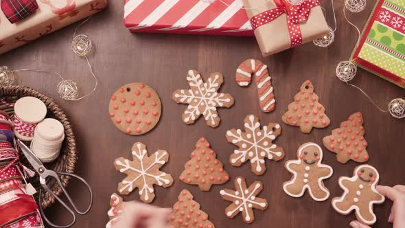 Time lapse. Packaging traditional home made gingerbread cookies as food gifts.