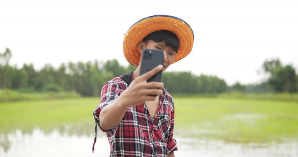 happy farmer making selfie portrait and video call