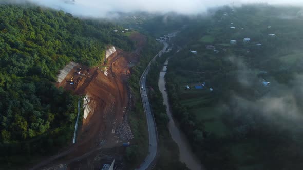 Road Construction On The Foggy Mountain Slope